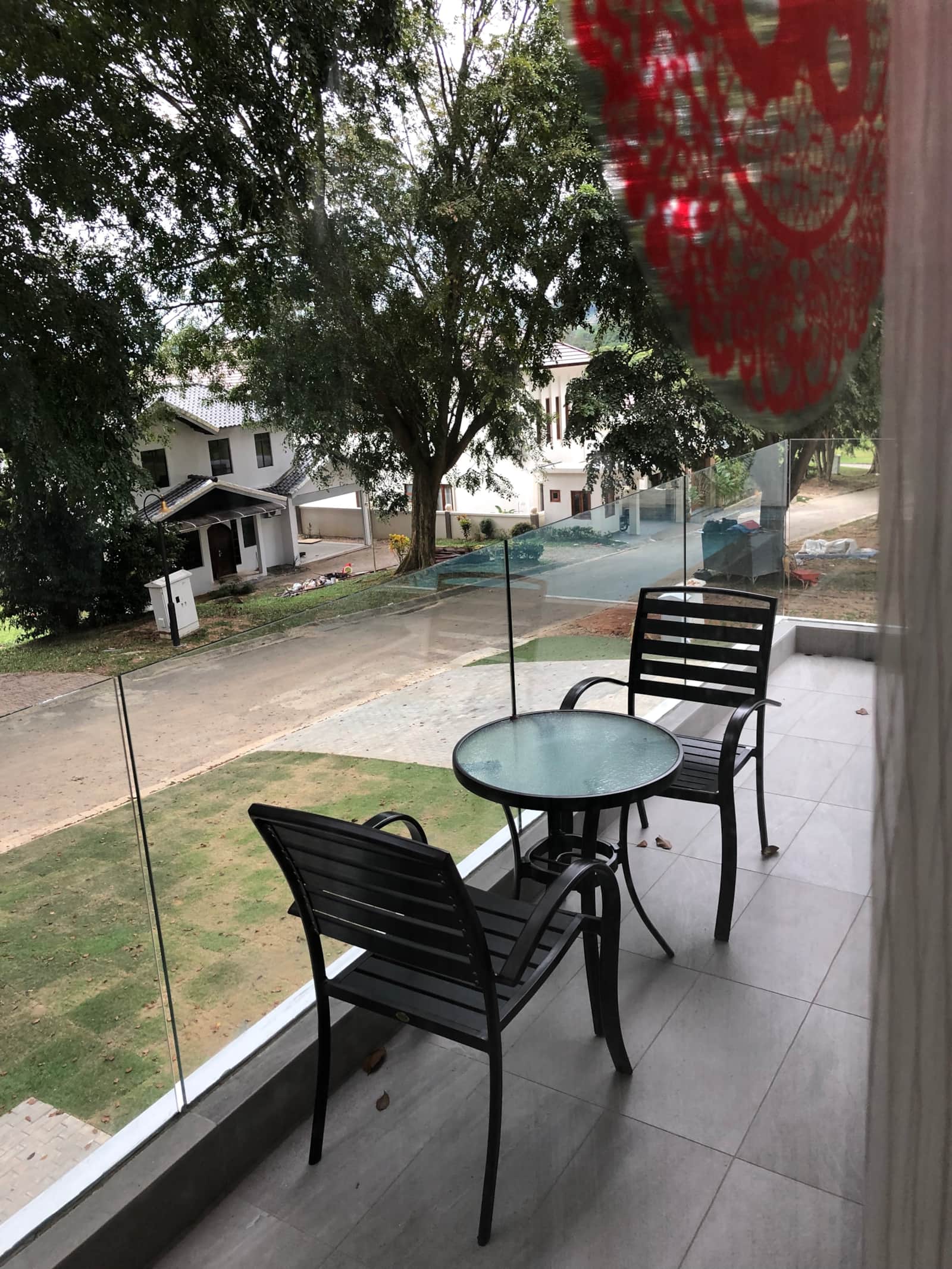 Balcony seating overlooking the greenery
