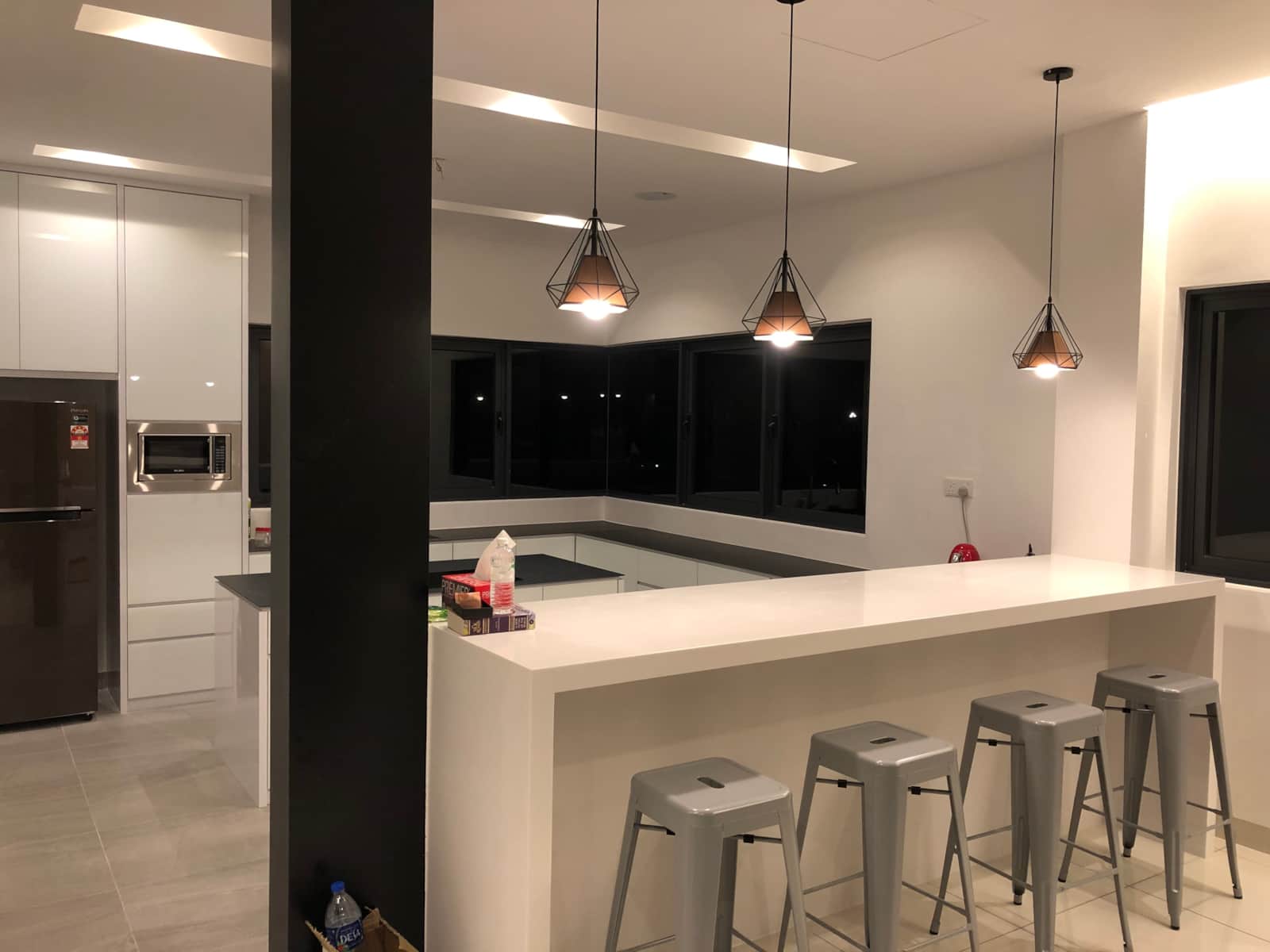 Kitchen with island and bar stools