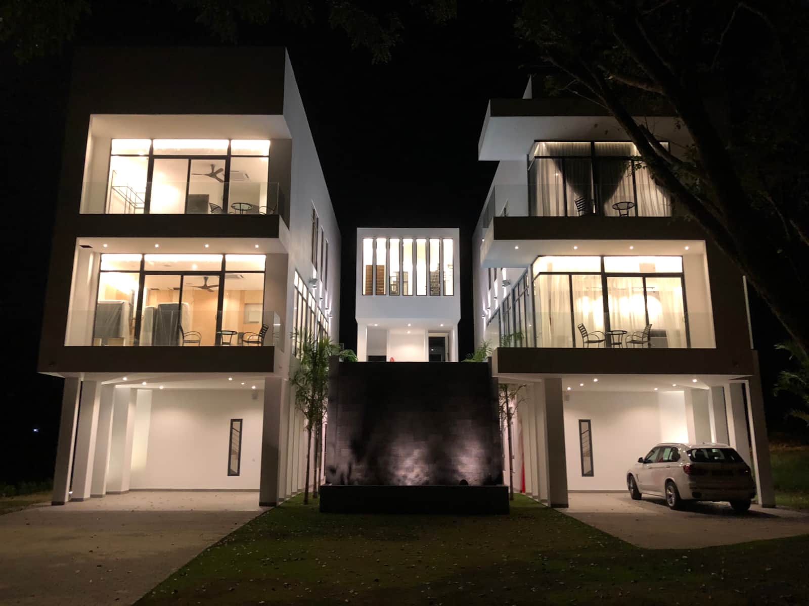 Front of the villa at night, Left and Right wings side by side